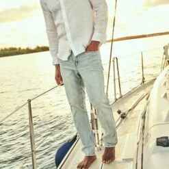 The Ultra-Stretch Driftwood Denim | Light Wash -Fair Harbor THEDRIFTWOODDENIMPANT LIGHTWASH LIFESTYLE 001 4895315e 84fe 476d a4b6 109fc438789f